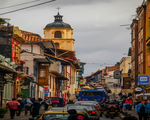 A view of street traffic and brick buildings in Bogota, Colombia